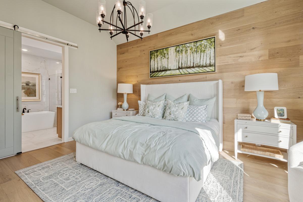 Bright bedroom with staged furniture and clean decor
