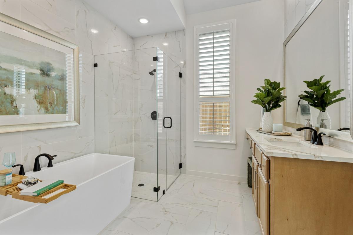 Well-lit bathroom with clean fixtures and neutral tones